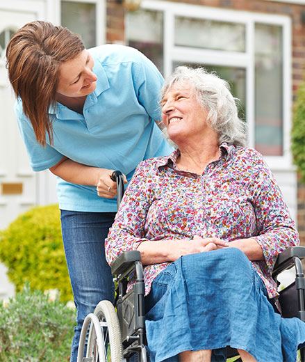 A matched caregiver spending time with a senior client