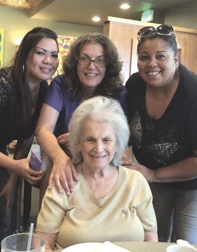 A Caring Hands client with her caregiver